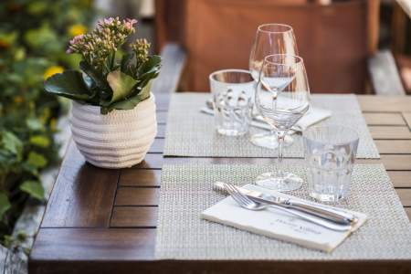 Table on terrace Flocons Village Restaurant Megève Centre Emmanuel Renaut